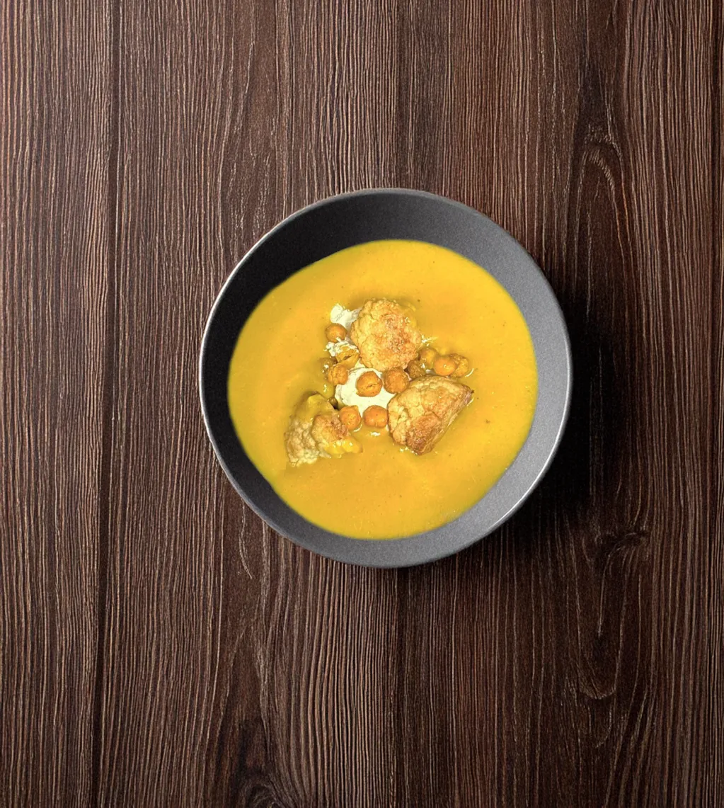 Photo du velouté de chou-fleur au curry et pois chiches croustillants