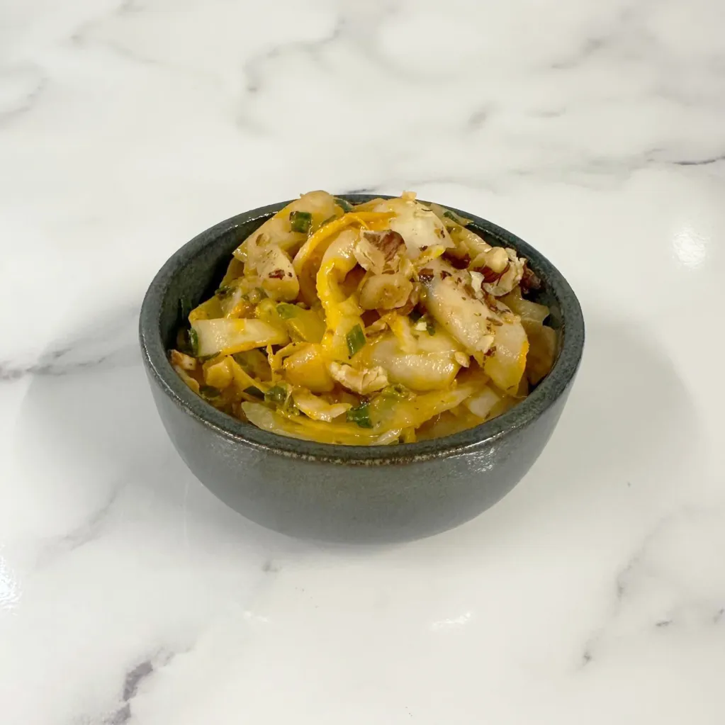 Fenouil croquant, pesto rouge et noisette